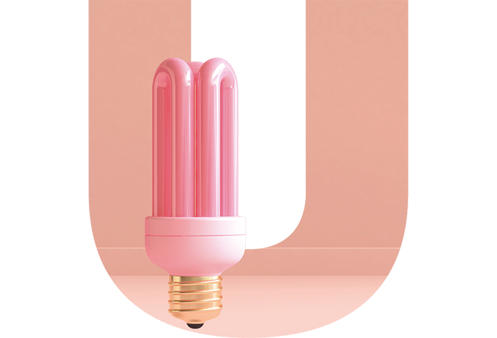 Pink modern light bulb over a pink U