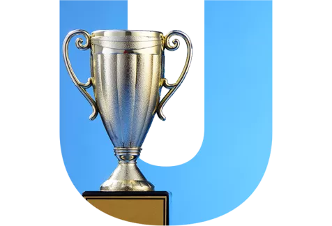 Winner cup over a blue U
