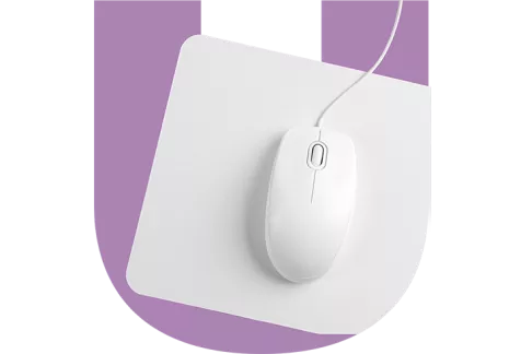 Computer mouse over a purple U