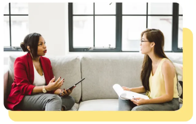 Two businesswomen having a discussion